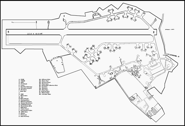 Eine Schwarz-Weiß-Zeichnung eines Stadtplans mit zahlreichen Gebäuden, wahrscheinlich ein Lageplan für eine neue Schule, mit Text auf der linken Seite, der das Layout detailliert.