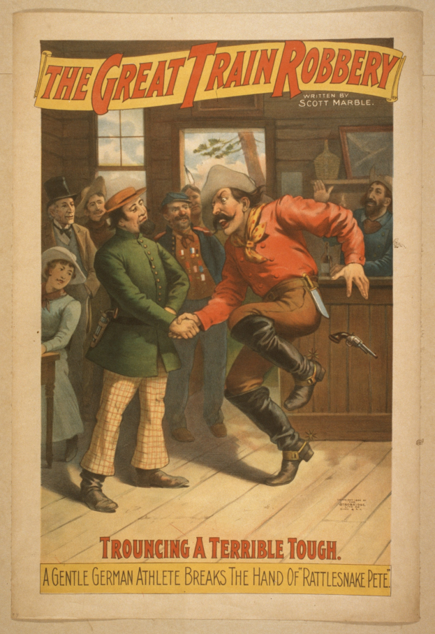 Ein Plakat zeigt eine Gruppe von Menschen, die drinnen stehen, einer hält eine Waffe, mit Text oben und unten: "Der große Zugraub - Trouching a Terrible Tough".